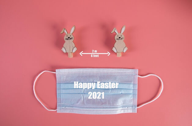 social-distancing-concept-with-cute-easter-bunnies-medical-face-mask-and-happy-easter-2021-text_cc-by-20 (1).jpg